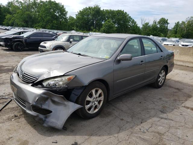 TOYOTA CAMRY LE 2005 with VIN 4T1BF30K55U609803 - Photo from auction