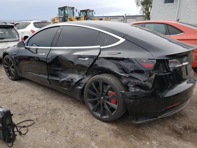 Photo 2 from auction – 2020 TESLA MODEL 3 with VIN 5YJ3E1EC4LF713125