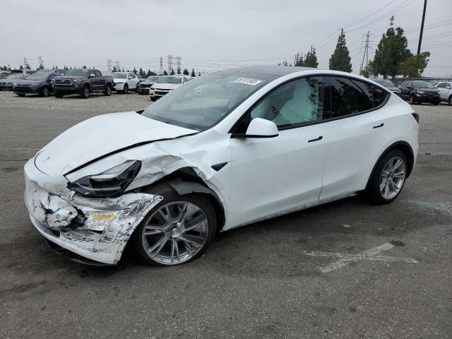 TESLA MODEL Y 2022 with VIN 7SAYGAEE0NF347509 - Photo from auction