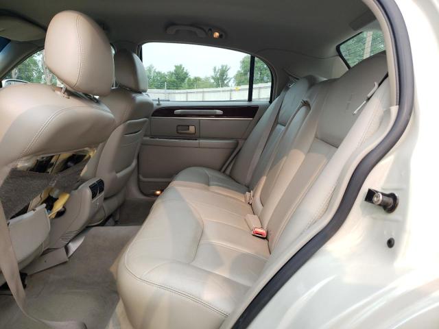 Photo 10 from auction – 2004 LINCOLN TOWN CAR U with VIN 1LNHM83W04Y663786
