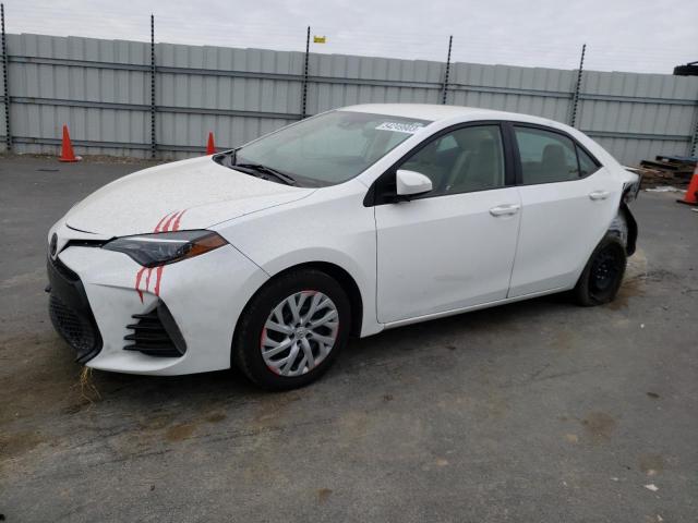 TOYOTA COROLLA L 2018 with VIN 5YFBURHE9JP784428 - Photo from auction