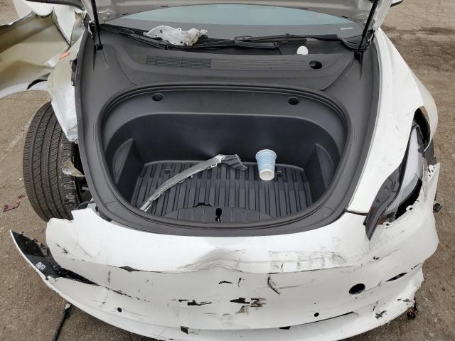 Photo 11 from auction – 2022 TESLA MODEL 3 with VIN 5YJ3E1EB4NF133965