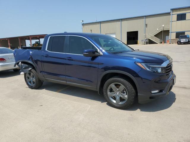 Photo 4 from auction – 2023 HONDA RIDGELINE with VIN 5FPYK3F58PB030481