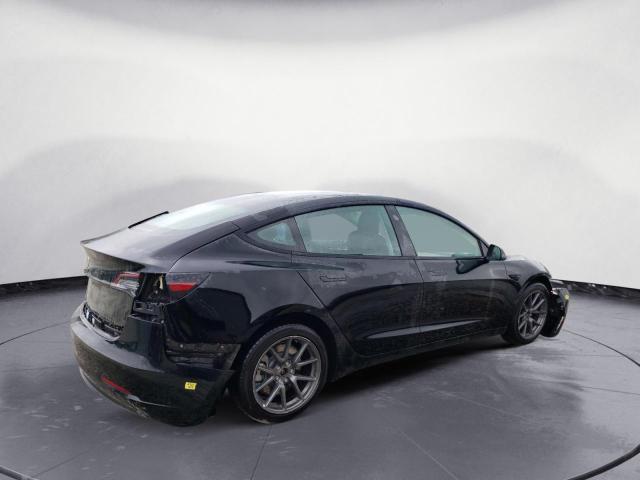 Photo 3 from auction – 2022 TESLA MODEL 3 with VIN 5YJ3E1EA4NF185765