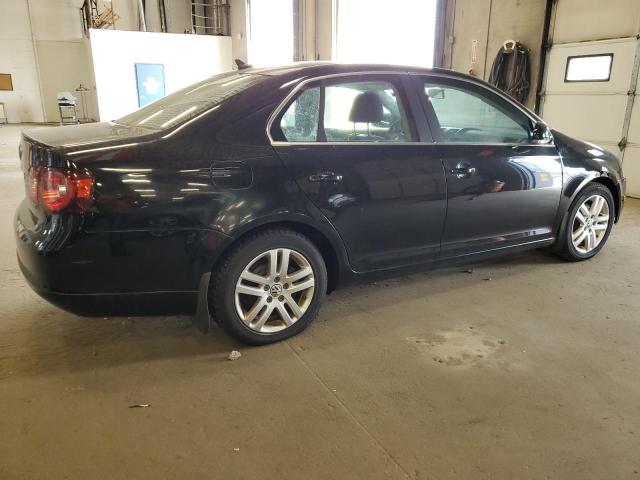 Photo 3 from auction – 2009 VOLKSWAGEN JETTA with VIN 3VWCL71K19M001923