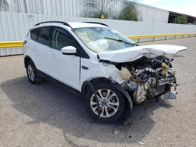 Photo 4 from auction – 2018 FORD ESCAPE SE with VIN 1FMCU0G90JUC63682