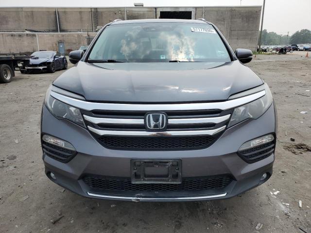 Photo 5 from auction – 2016 HONDA PILOT ELIT with VIN 5FNYF6H08GB098893
