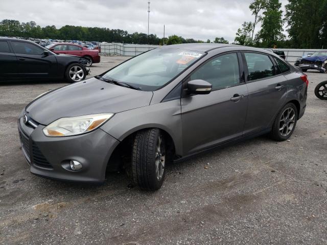 FORD FOCUS SE 2013 with VIN 1FADP3F26DL211897 - Photo from auction