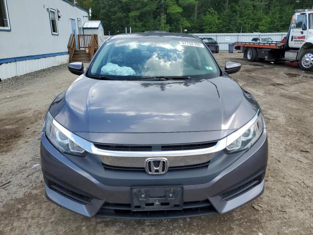 Photo 5 from auction – 2018 HONDA CIVIC LX with VIN 19XFC2F53JE208947