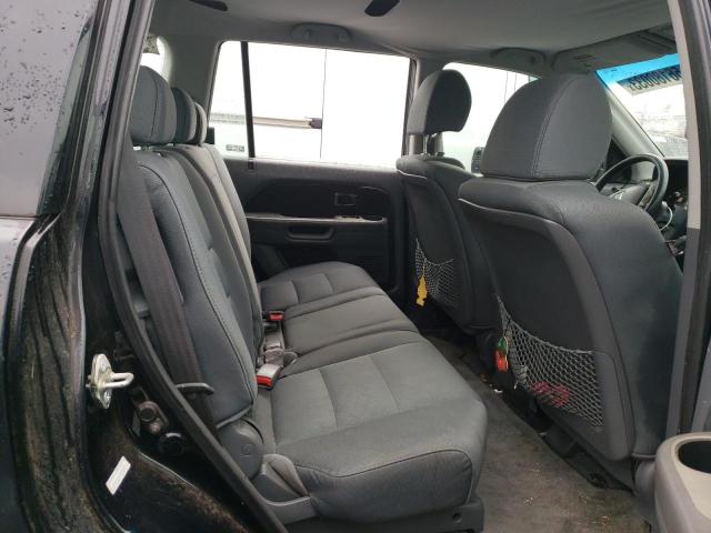 Photo 11 from auction – 2006 HONDA PILOT LX with VIN 2HKYF18136H552995
