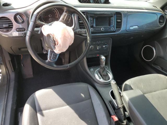 Photo 8 from auction – 2014 VOLKSWAGEN BEETLE with VIN 3VWJL7AT2EM608276