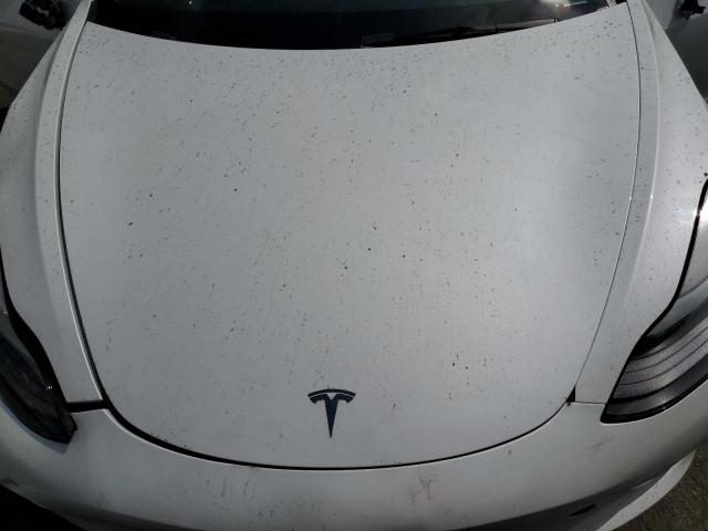 Photo 11 from auction – 2022 TESLA MODEL 3 with VIN 5YJ3E1EA0NF143240