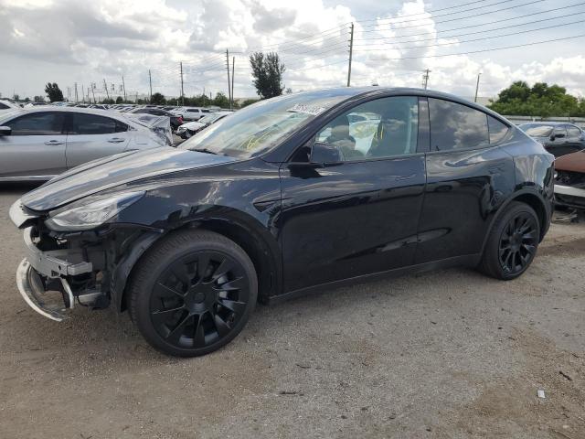 TESLA MODEL Y 2022 with VIN 7SAYGDEE4NF422598 - Photo from auction