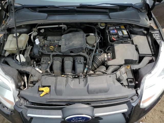 Photo 11 from auction – 2013 FORD FOCUS SE with VIN 1FADP3F23DL354533