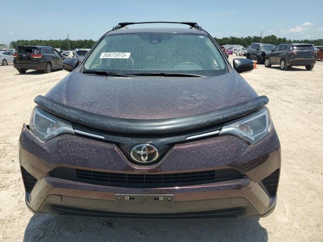 Photo 5 from auction – 2017 TOYOTA RAV4 LE with VIN 2T3BFREV9HW597379