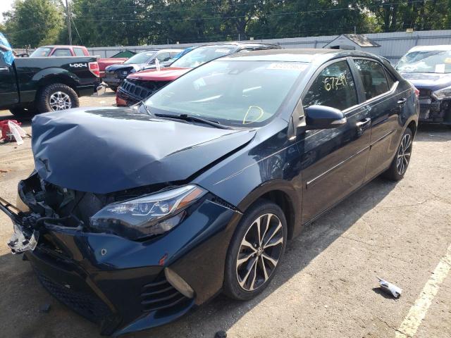TOYOTA COROLLA L 2018 with VIN 5YFBURHE0JP780929 - Photo from auction