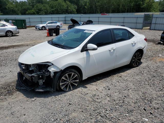 TOYOTA COROLLA L 2019 with VIN 5YFBURHE1KP885531 - Photo from auction