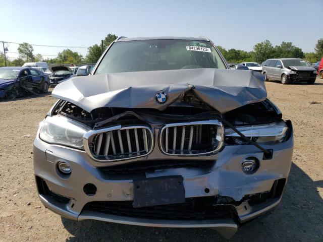 Photo 5 from auction – 2014 BMW X5 XDRIVE3 with VIN 5UXKR0C5XE0C27873