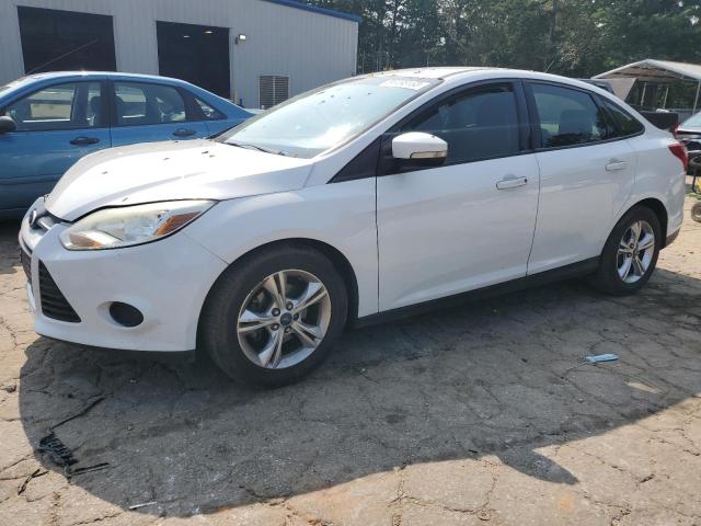 FORD FOCUS SE 2013 with VIN 1FADP3F20DL311610 - Photo from auction