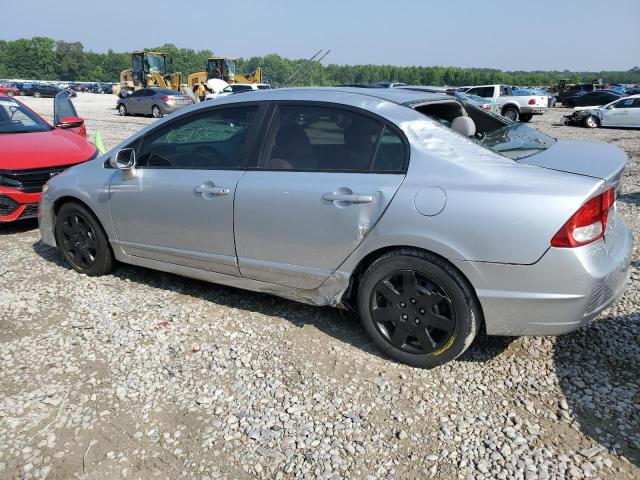 Photo 2 from auction – 2011 HONDA CIVIC LX with VIN 19XFA1F59BE030074