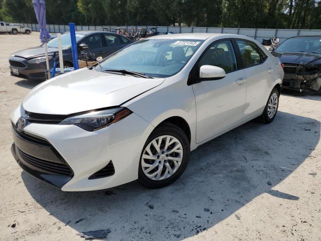 TOYOTA COROLLA L 2018 with VIN 5YFBURHEXJP765516 - Photo from auction