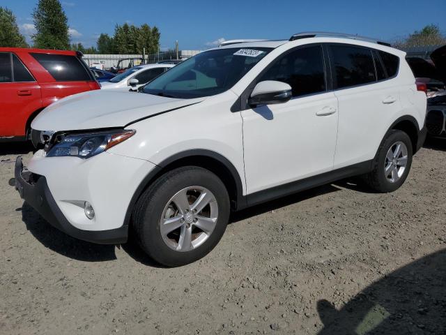 TOYOTA RAV4 XLE 2014 with VIN JTMRFREV9ED050975 - Photo from auction