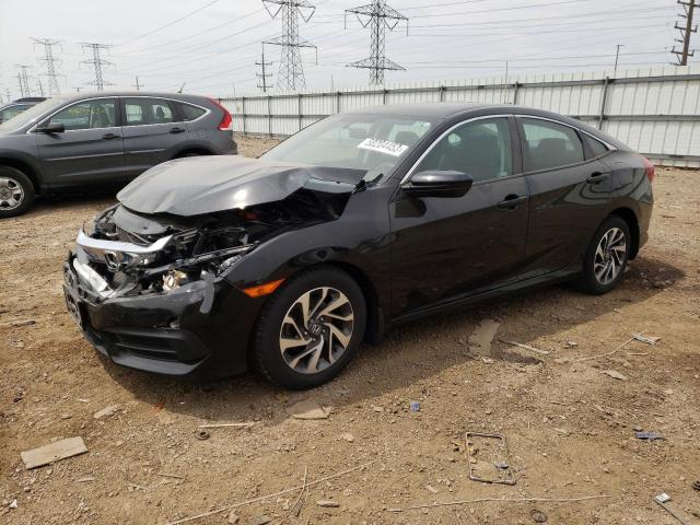 HONDA CIVIC EX 2018 with VIN 19XFC2F72JE033771 - Photo from auction