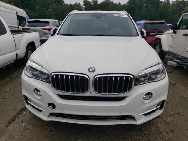 Photo 5 from auction – 2014 BMW X5 XDRIVE3 with VIN 5UXKS4C59E0J94325