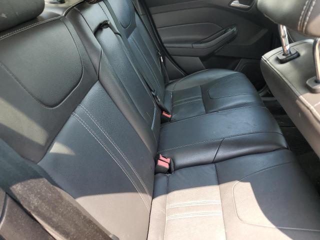 Foto 10 de la subasta – 2014 FORD FOCUS SE con VIN 1FADP3F21EL216247