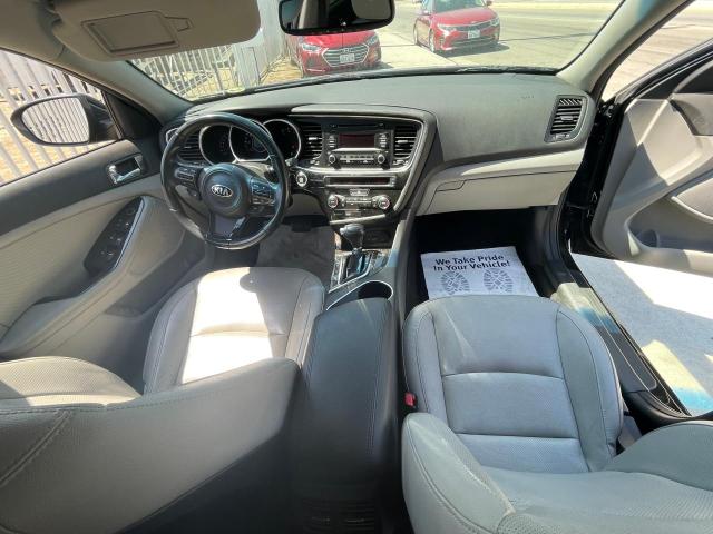 Photo 9 from auction – 2014 KIA OPTIMA EX with VIN 5XXGN4A70EG346736