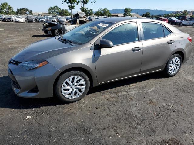 TOYOTA COROLLA L 2017 with VIN 5YFBURHE9HP650125 - Photo from auction