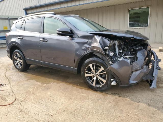 Photo 4 from auction – 2018 TOYOTA RAV4 with VIN JTMRFREV5JD249015