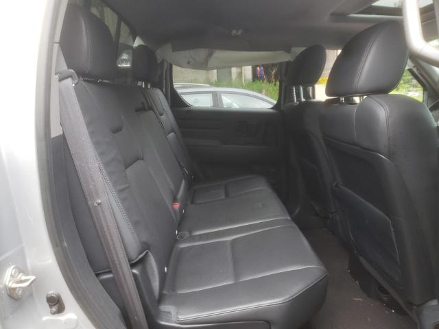 Фото 10 с аукциона – 2014 HONDA RIDGELINE с VIN 5FPYK1F58EB502406