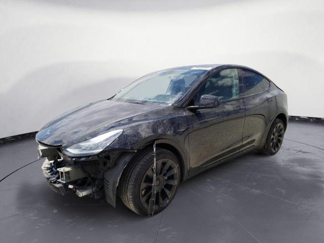 TESLA MODEL Y 2022 con VIN 7SAYGDEE0NF481115 - Foto de la subasta