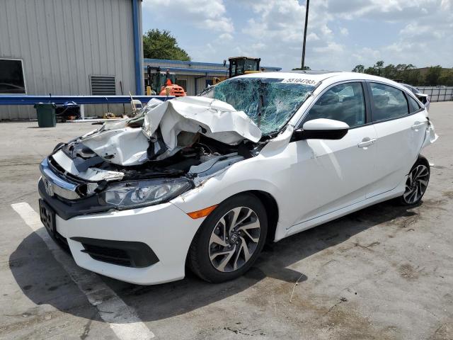 HONDA CIVIC EX 2018 with VIN 19XFC2F73JE036890 - Photo from auction