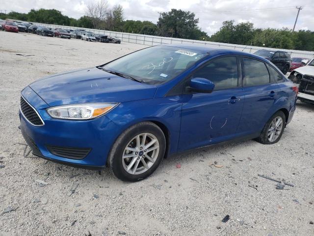 FORD FOCUS SE 2018 with VIN 1FADP3FE9JL210703 - Photo from auction