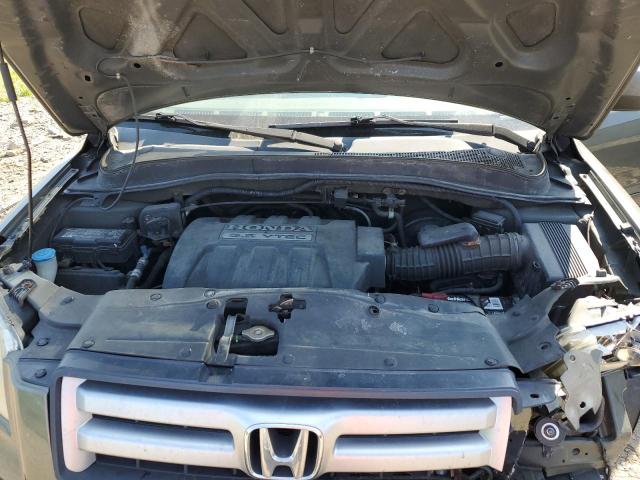 Photo 12 from auction – 2006 HONDA PILOT EX with VIN 2HKYF184X6H525447