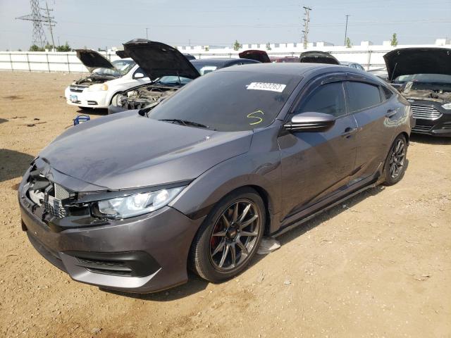 HONDA CIVIC EX 2018 with VIN 19XFC2F75JE043954 - Photo from auction