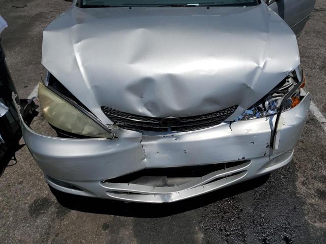 Photo 11 from auction – 2004 TOYOTA CAMRY LE with VIN 4T1BE30KX4U351876