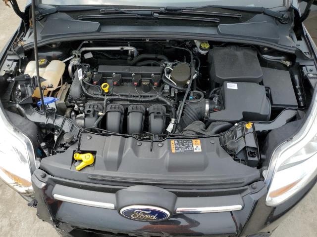 Photo 11 from auction – 2014 FORD FOCUS SE with VIN 1FADP3F21EL450727