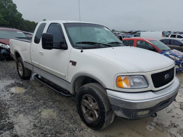 Foto 4 de la subasta – 2000 FORD F150 con VIN 1FTRX18L9YNA77584