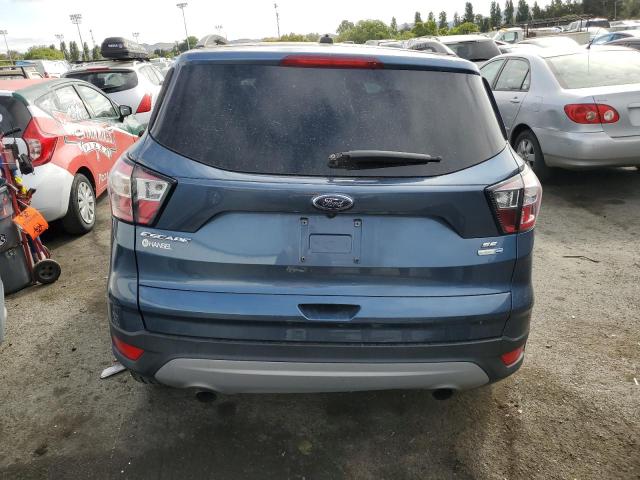 Photo 6 from auction – 2018 FORD ESCAPE SE with VIN 1FMCU9GD9JUC10696