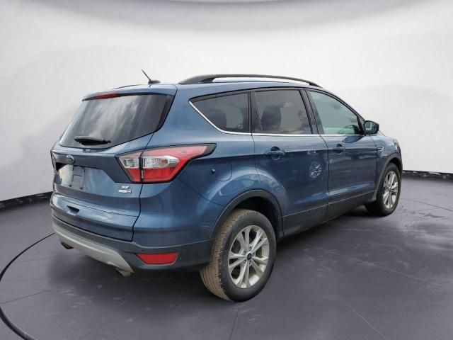 Photo 3 from auction – 2018 FORD ESCAPE SE with VIN 1FMCU9GD4JUC95110