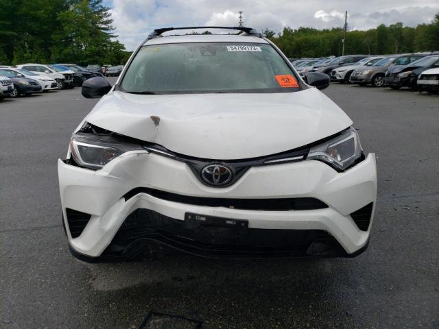 Photo 5 from auction – 2018 TOYOTA RAV4 LE with VIN 2T3BFREV7JW765283