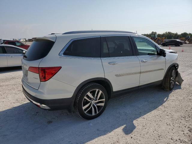 Photo 3 from auction – 2017 HONDA PILOT TOUR with VIN 5FNYF5H90HB014205