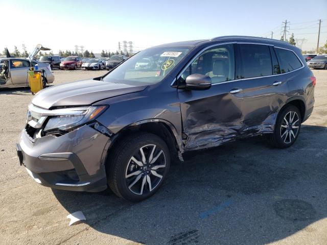 Photo 1 from auction – 2022 HONDA PILOT TOUR with VIN 5FNYF6H95NB016355