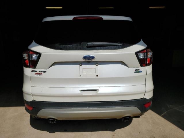 Photo 6 from auction – 2018 FORD ESCAPE with VIN 1FMCU9HD6JUA23379