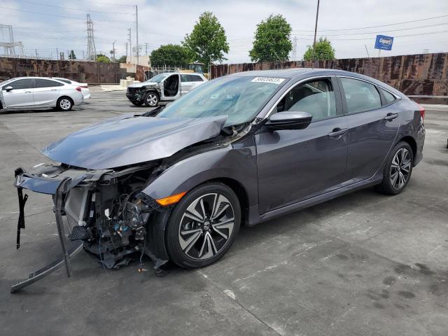 HONDA CIVIC EXL 2017 with VIN 2HGFC1F74HH641608 - Photo from auction