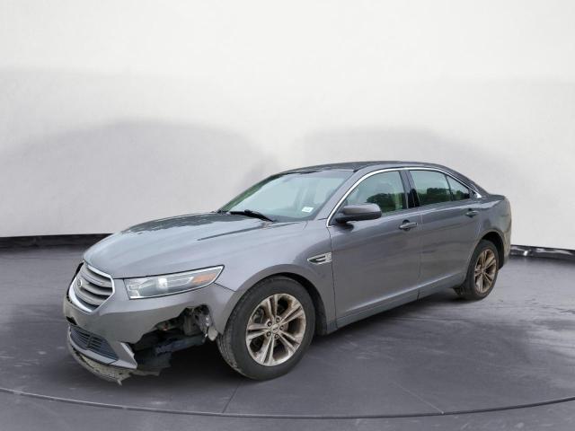 FORD TAURUS SEL 2014 with VIN 1FAHP2E82EG173550 - Photo from auction