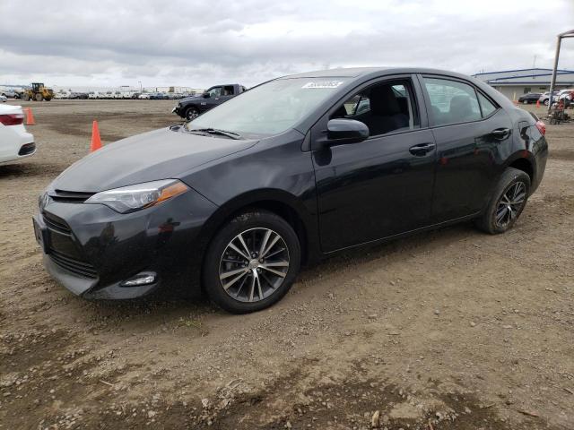 TOYOTA COROLLA L 2017 with VIN 5YFBURHE0HP656721 - Photo from auction